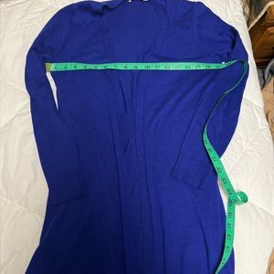 Ricky’s small bright blue open cardigan